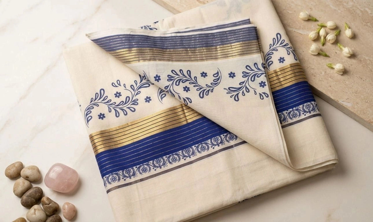 Off-White Kerala Cotton Saree with Indigo Floral Motifs & Gold Zari Border ONAM001